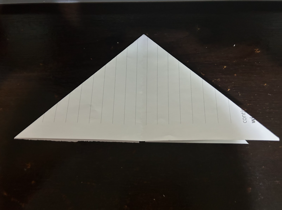 Folding top corners to center