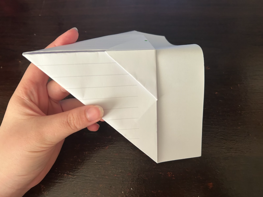 Folding top corners to center