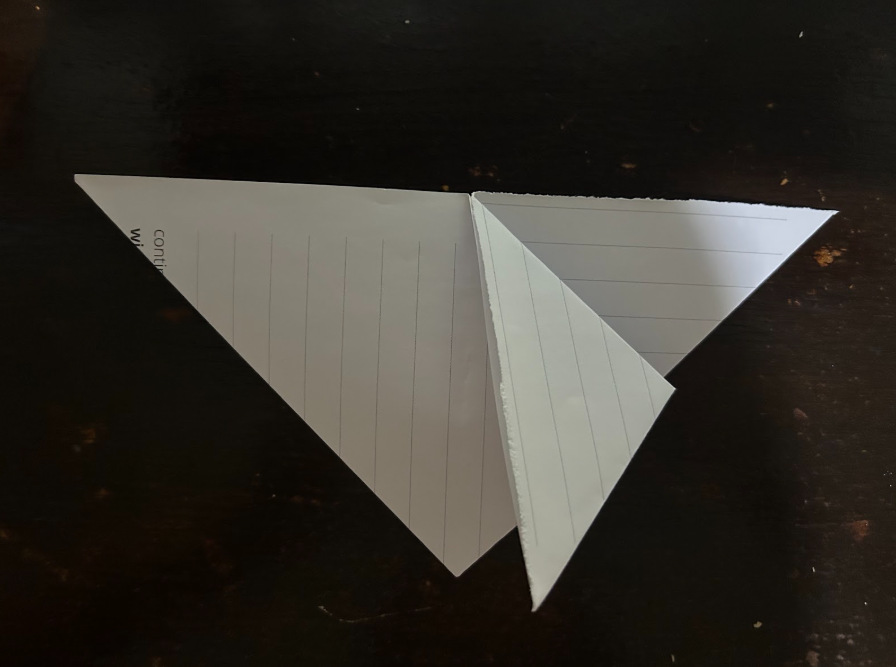 Folding top corners to center