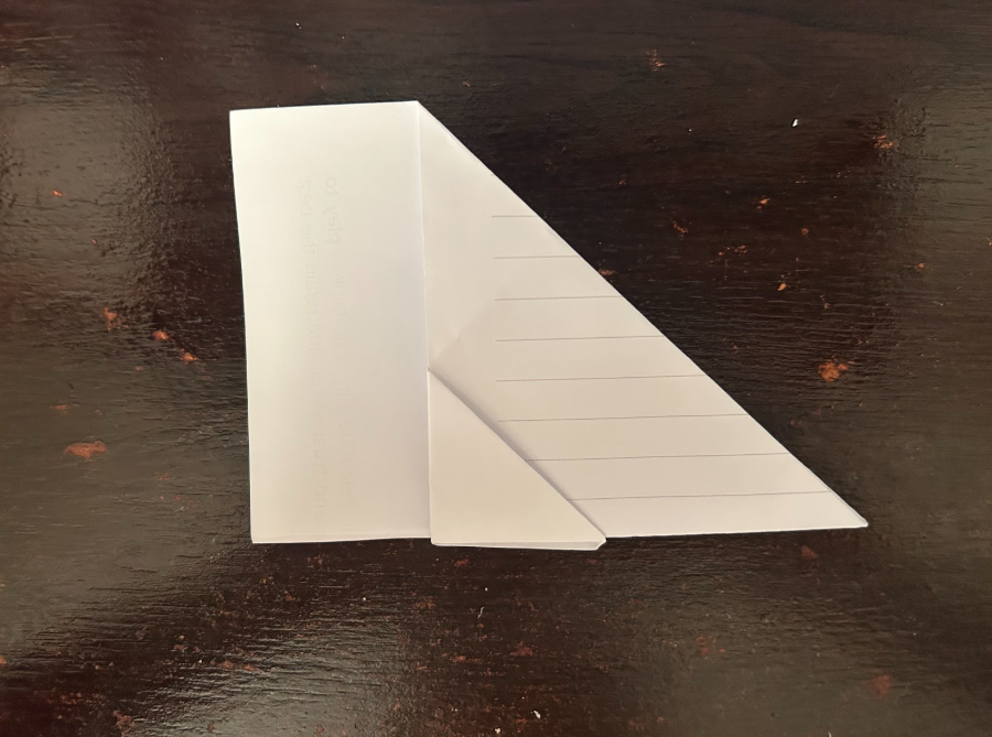 Folding top corners to center