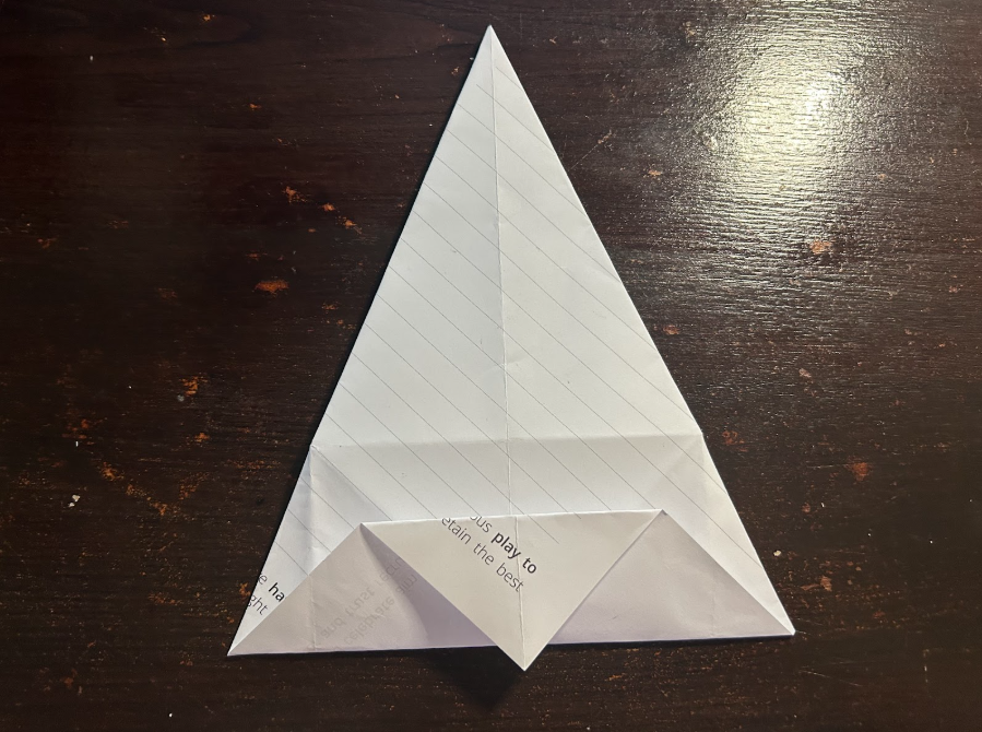 Folding top corners to center