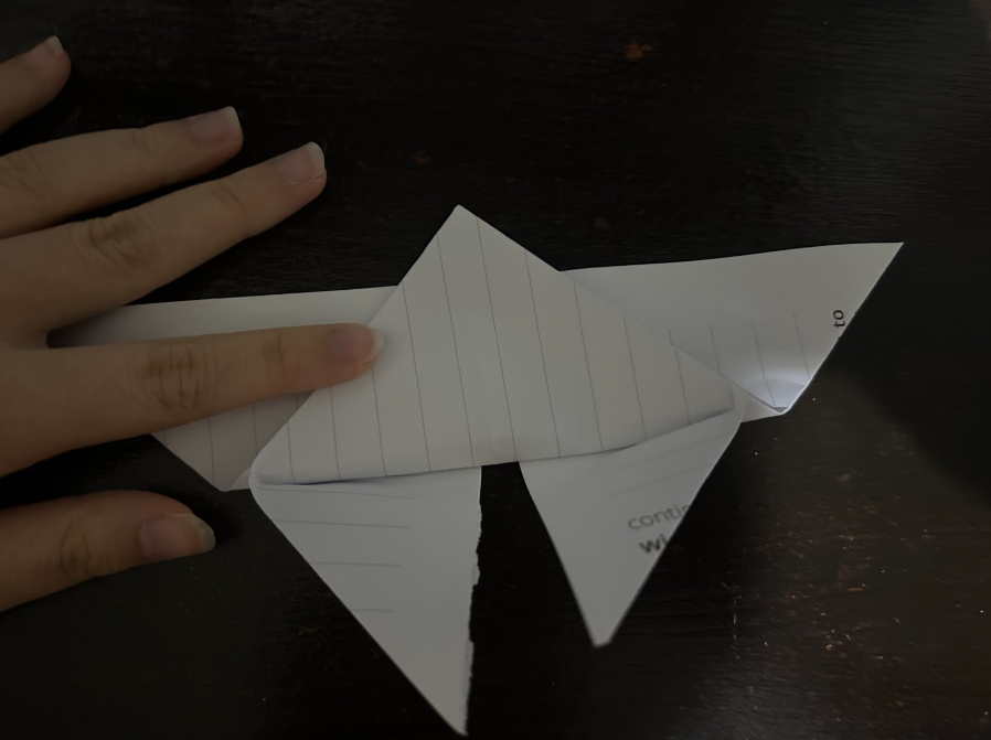 Folding top corners to center
