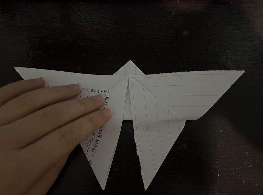 Folding top corners to center