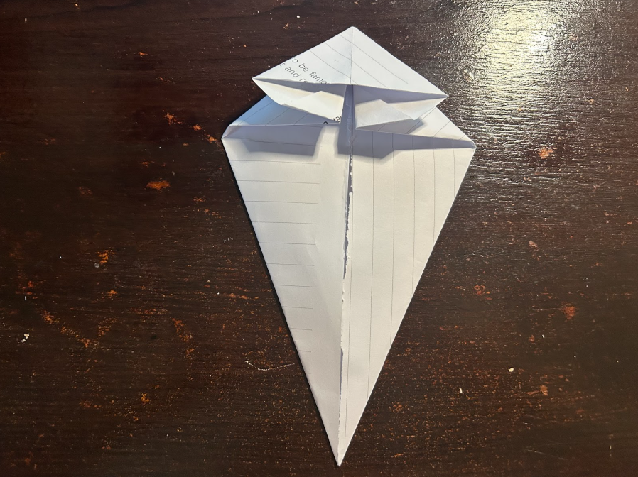 Folding top corners to center