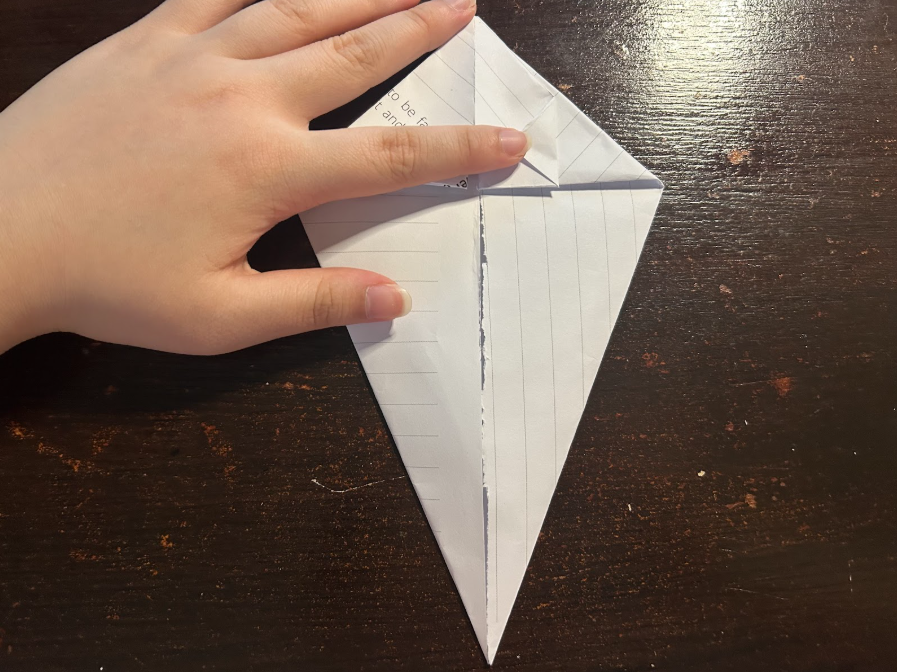 Folding top corners to center