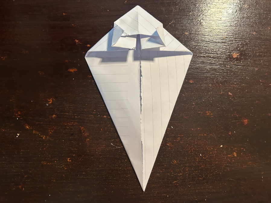Folding top corners to center