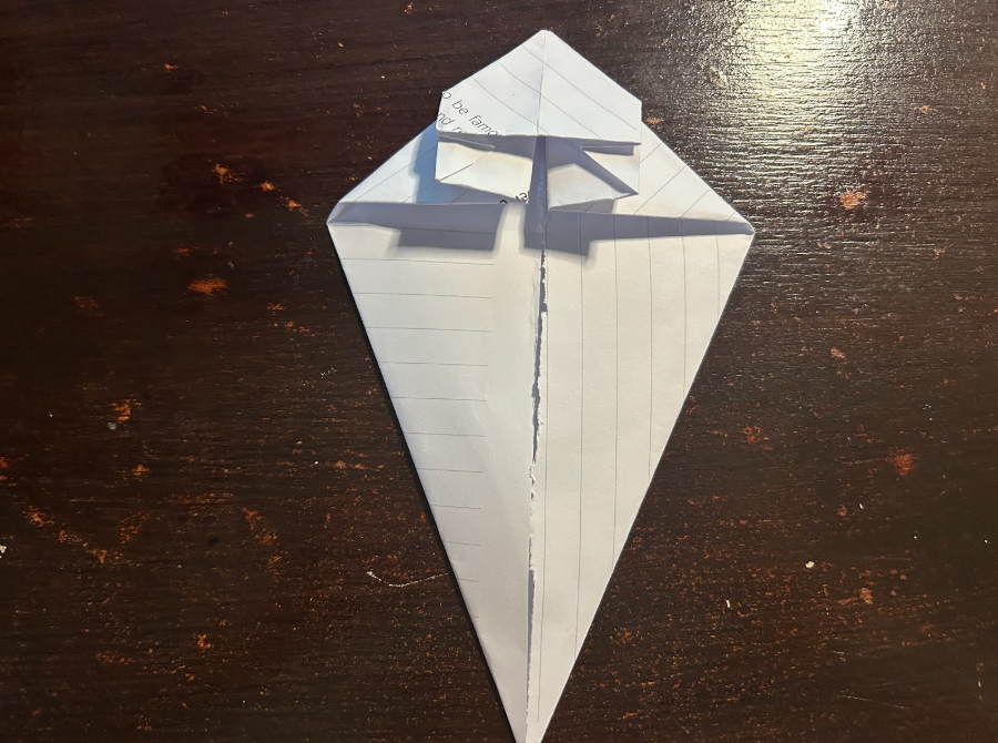 Folding top corners to center
