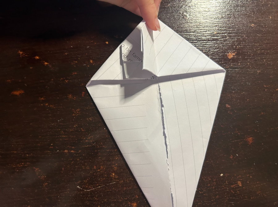 Folding top corners to center