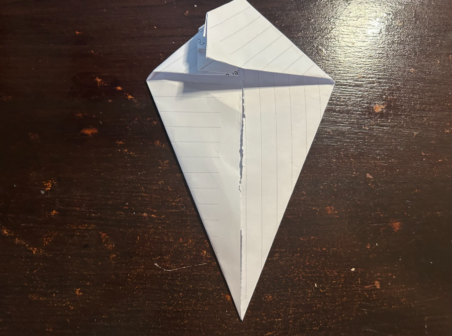 Folding top corners to center