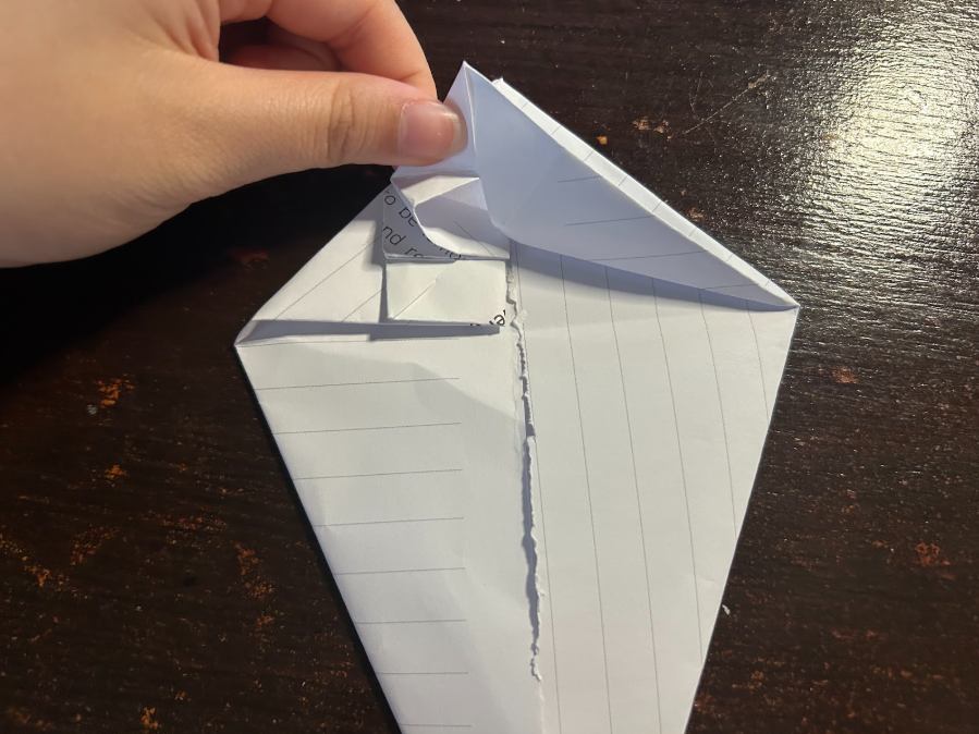 Folding top corners to center