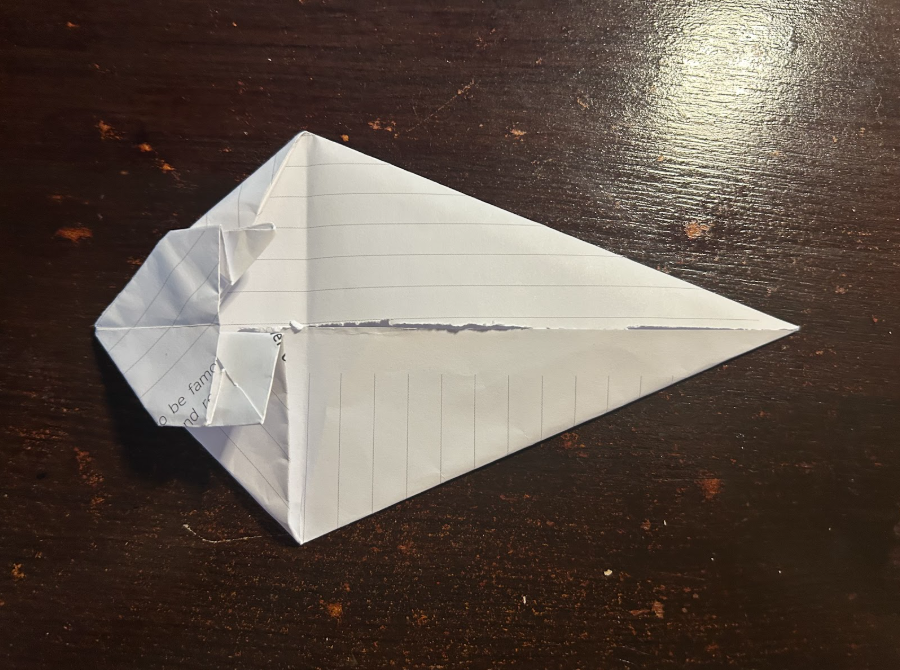 Folding top corners to center