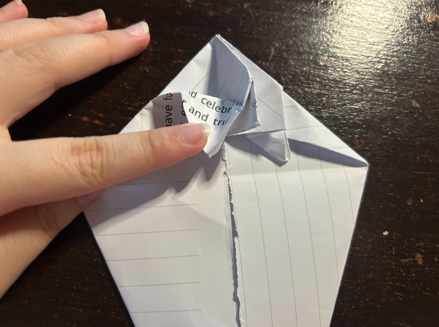 Folding top corners to center