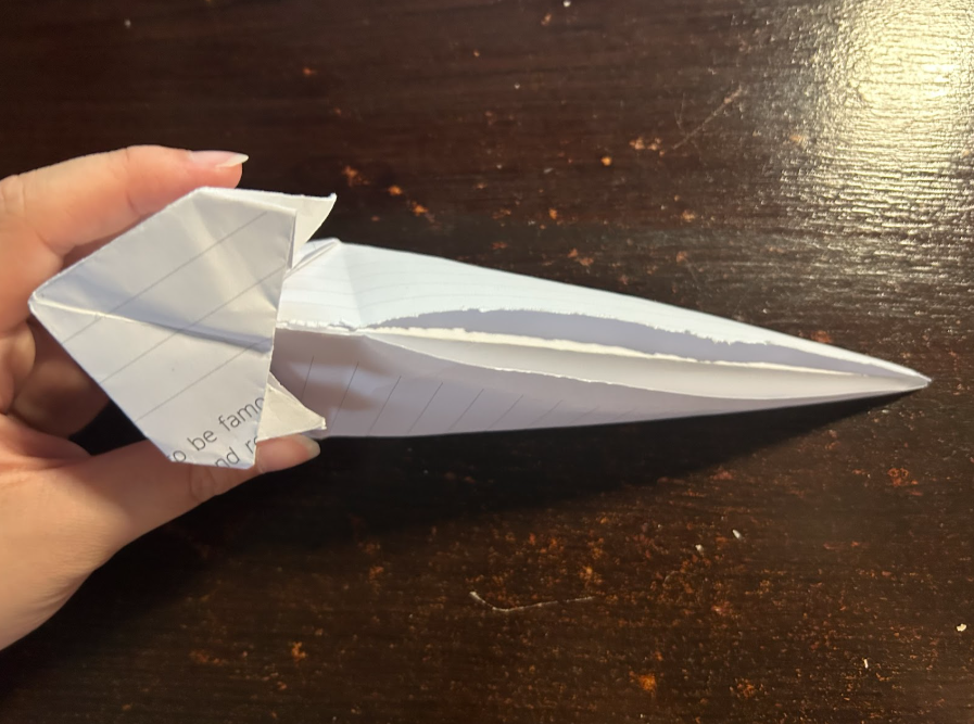 Folding top corners to center