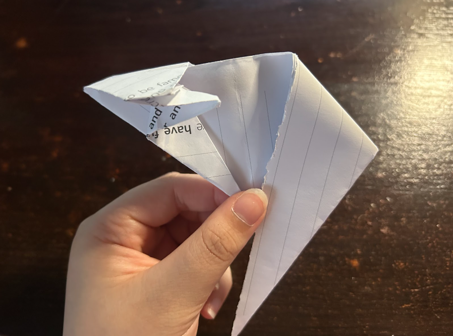 Folding top corners to center