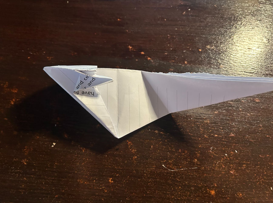 Folding top corners to center