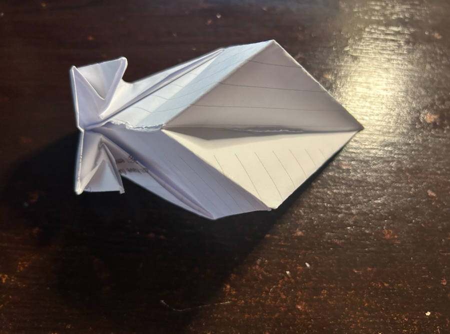 Folding top corners to center