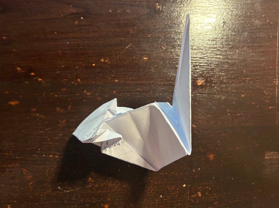 Folding top corners to center