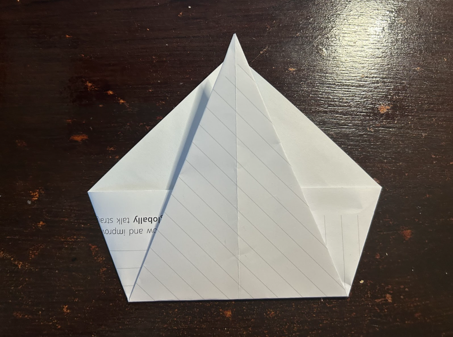 Folding top corners to center