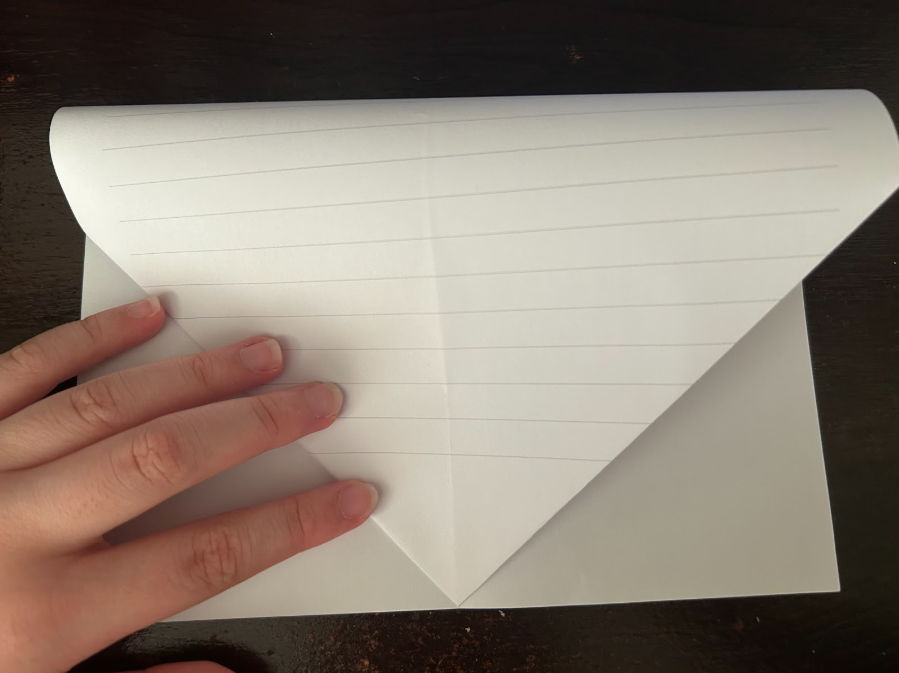 Folding top corners to center
