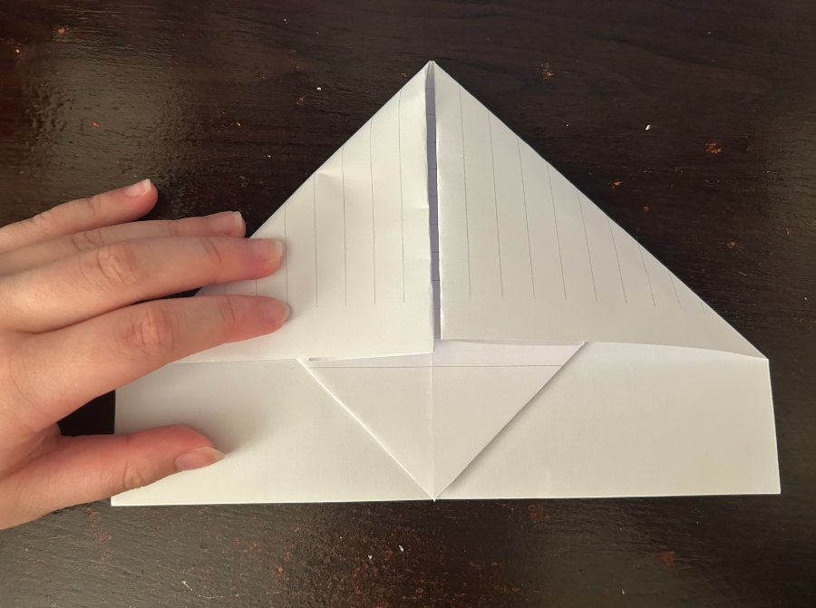Folding top corners to center