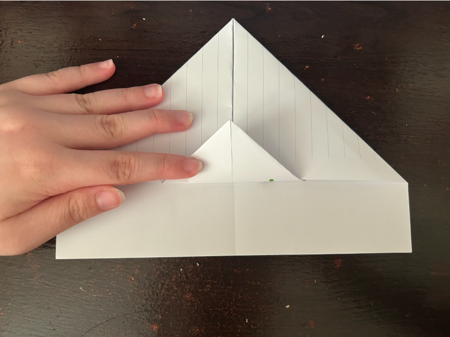 Folding top corners to center